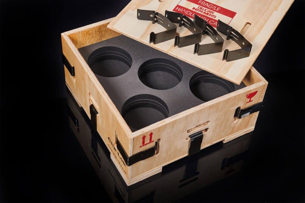 Reusable collapsible plywood box with spring steel clips by Clip-Lok SA